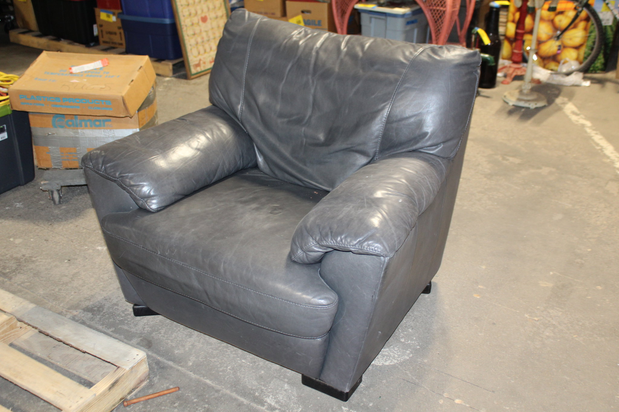 Picture of Black Leather Armchair with Matching Ottoman