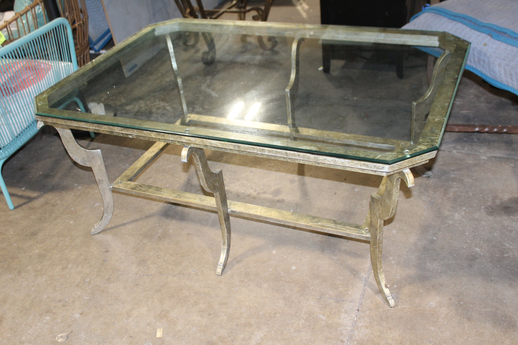 Picture of Glass Top Metal Coffee Table with Curved Legs
